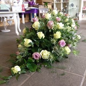 A funeral director may have to organise for receipt of flowers.